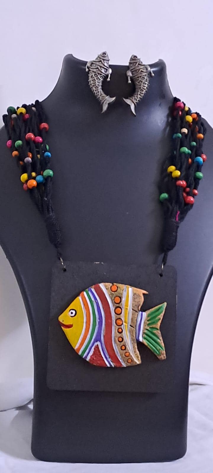 Terracotta fish pendant and thread necklace