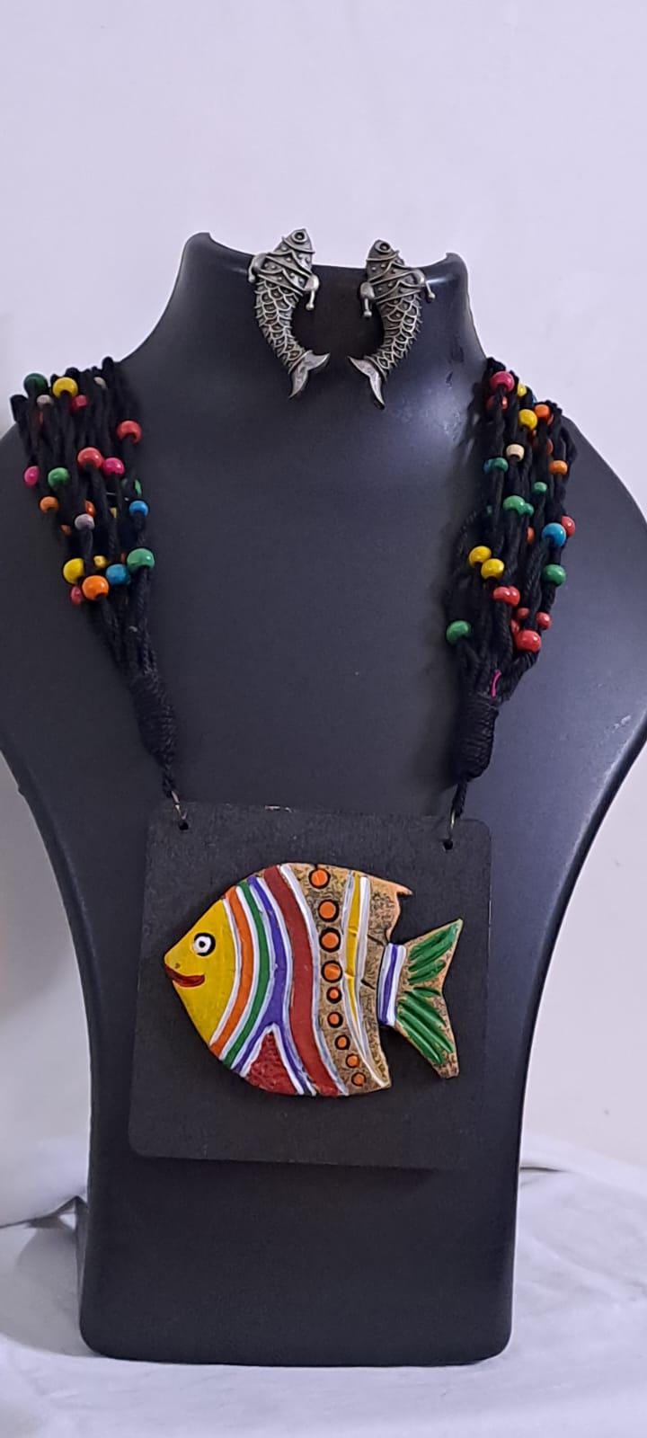 Terracotta fish pendant and thread necklace