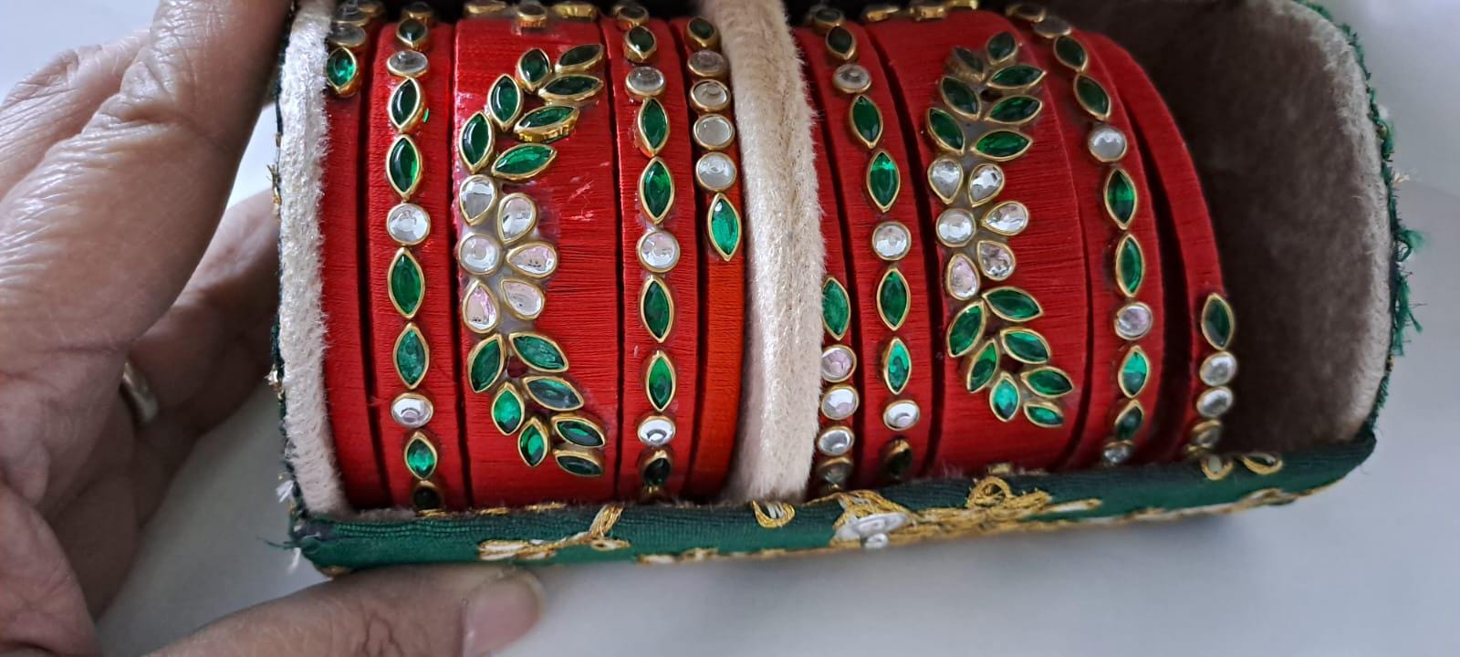 Red colour traditional thread kundan bangles with zari bangle box