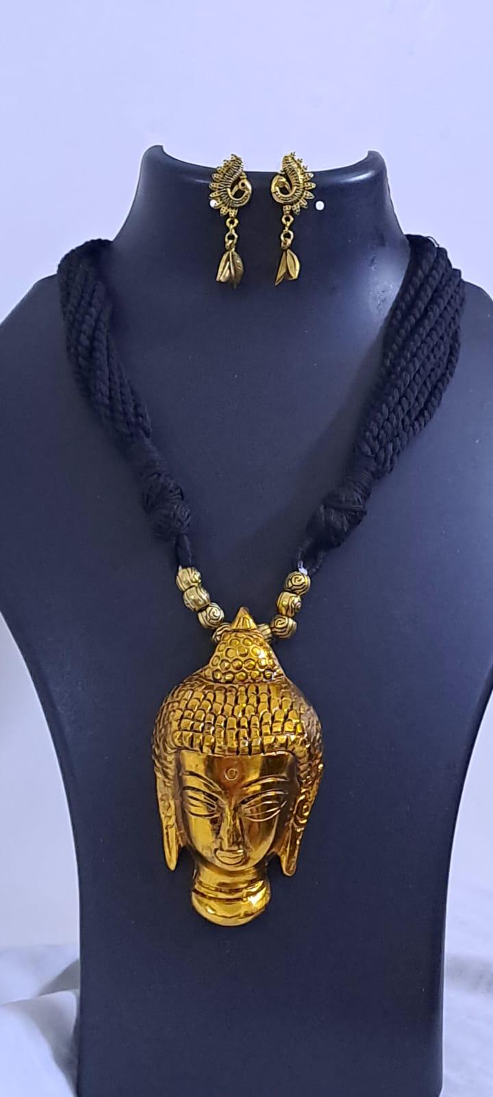 Black thread necklace with oxidised golden buddha pendant