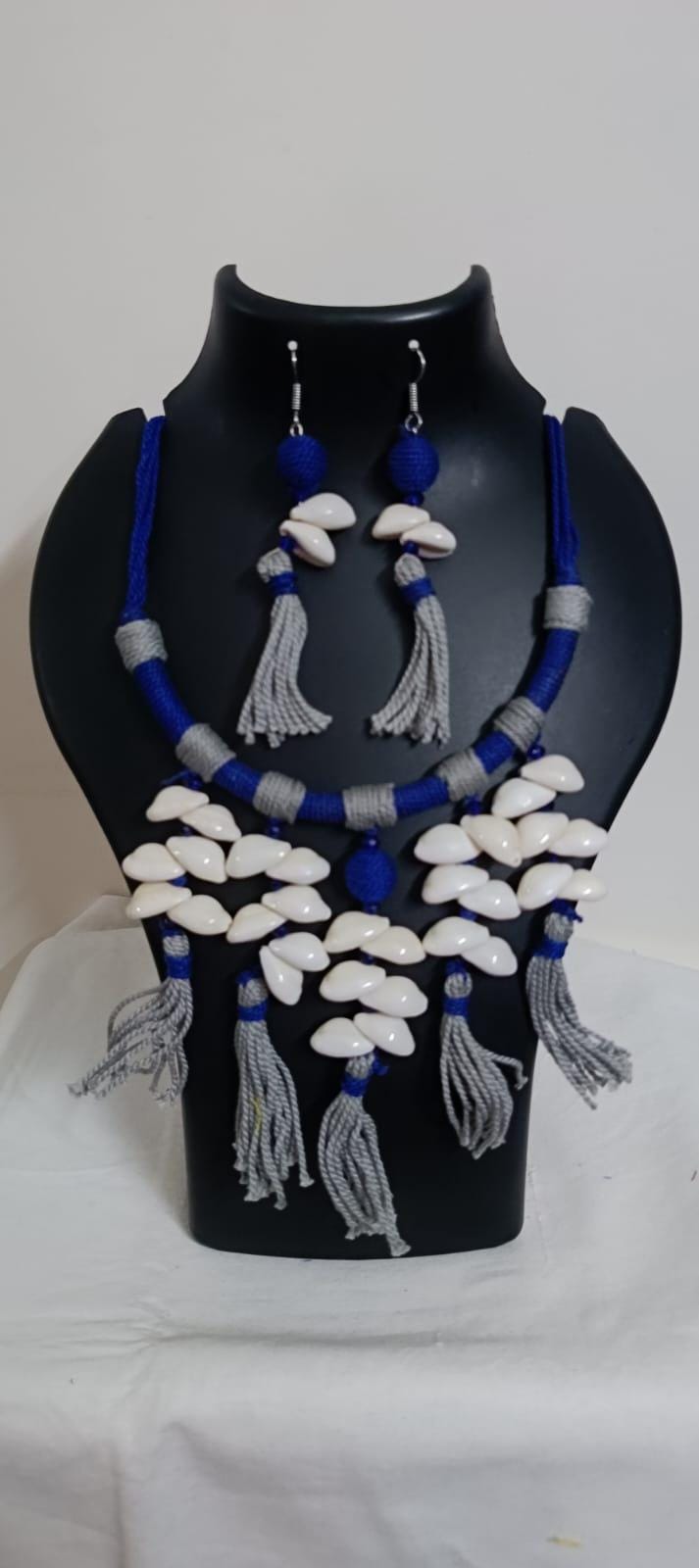Exclusive blue n grey hasuli thread necklace set with shell fringes n matching earrings