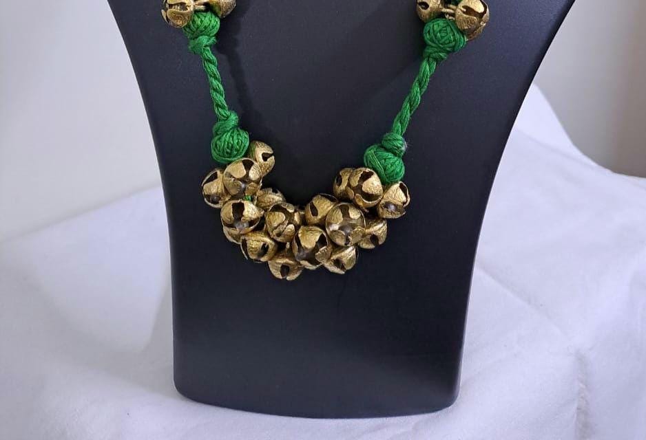 Green thread necklace set with trinkets n matching earrings