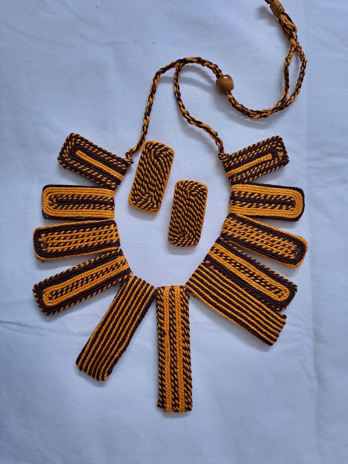 Exclusive brown n yellow thread necklace with rectangle shape thread beads and matching earrings.