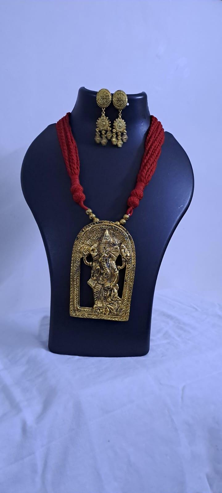 Maroon thread necklace with golden oxidised ganesha pendant