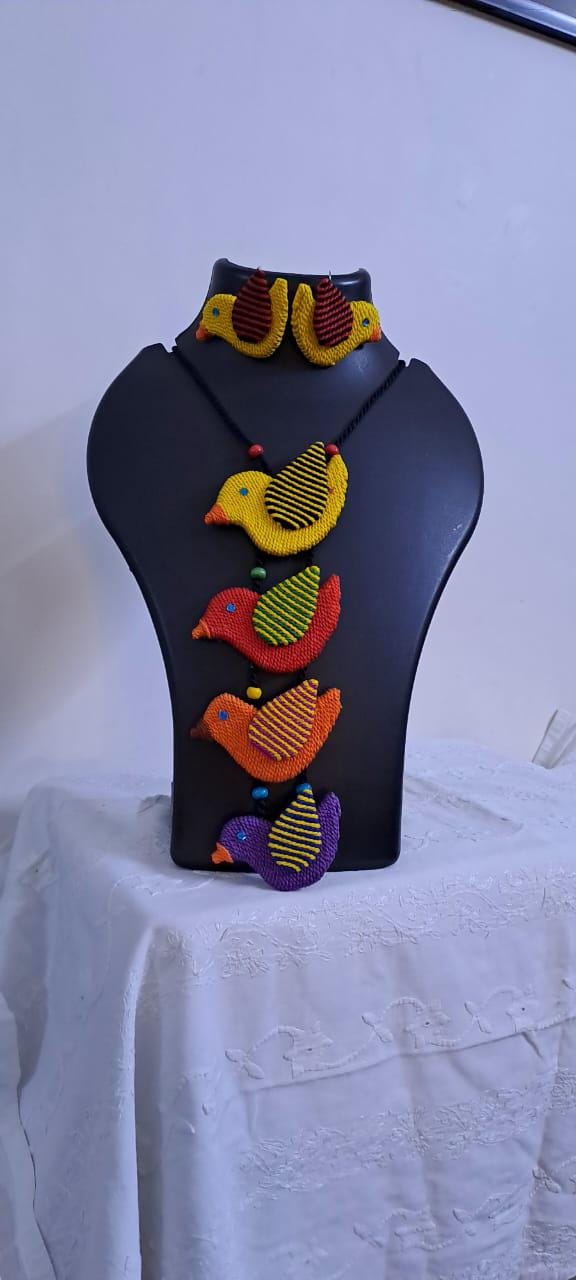 Multi coloured bird necklace and matching earrings