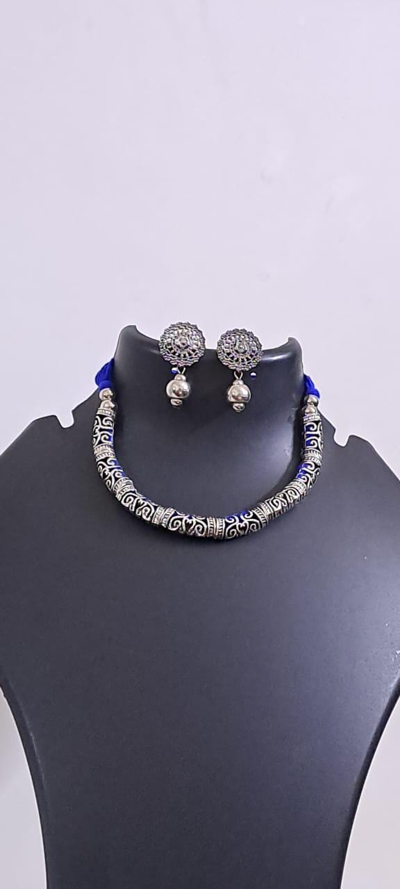 Exclusive silver oxidised hasuli set with matching earrings