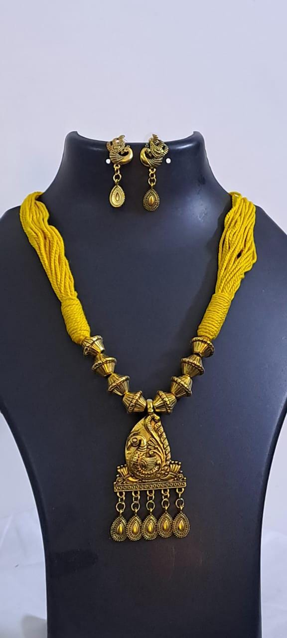 Yellow thread necklace with Golden oxidised traditional pendant