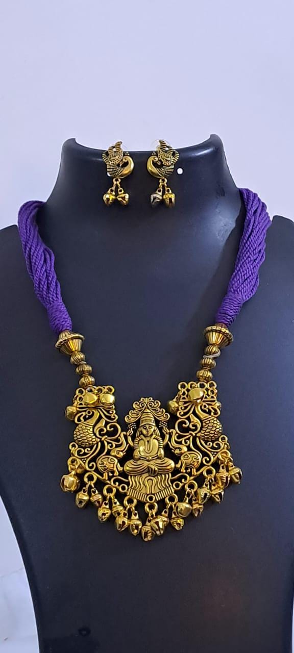 Purple thread necklace with Golden oxidised traditional pendant