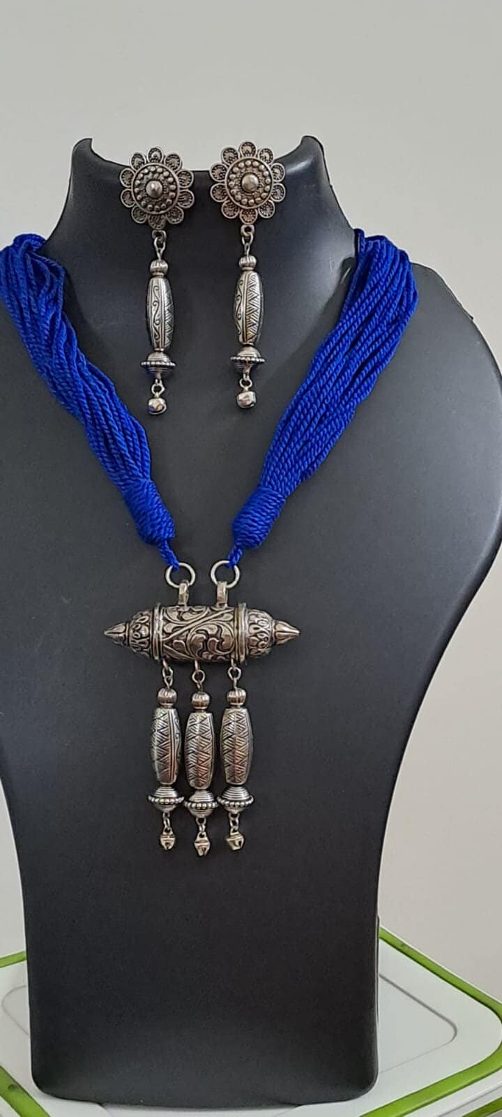 Blue thread necklace with silver oxidised traditional pendant