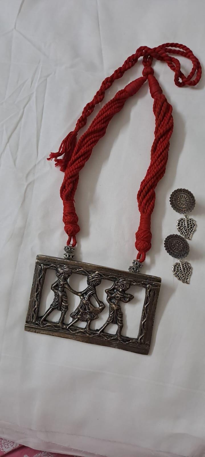 Maroon thread necklace set with dokra pendant n matching earrings