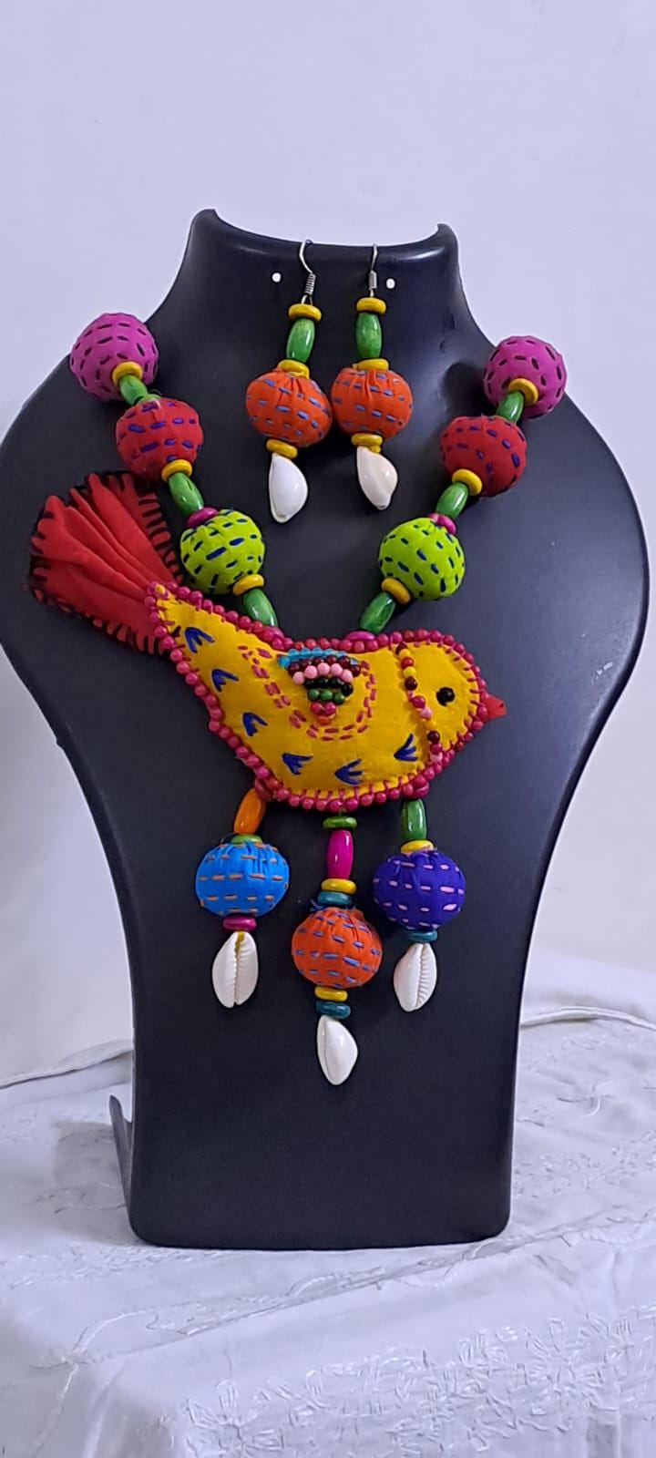 Exclusive fabric necklace with embroidered yellow fabric bird pendant and fabric beads n matching beads