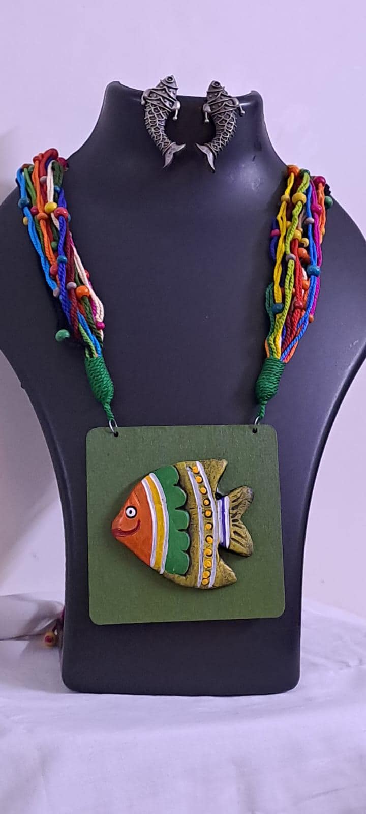 Terracotta fish pendant and thread necklace