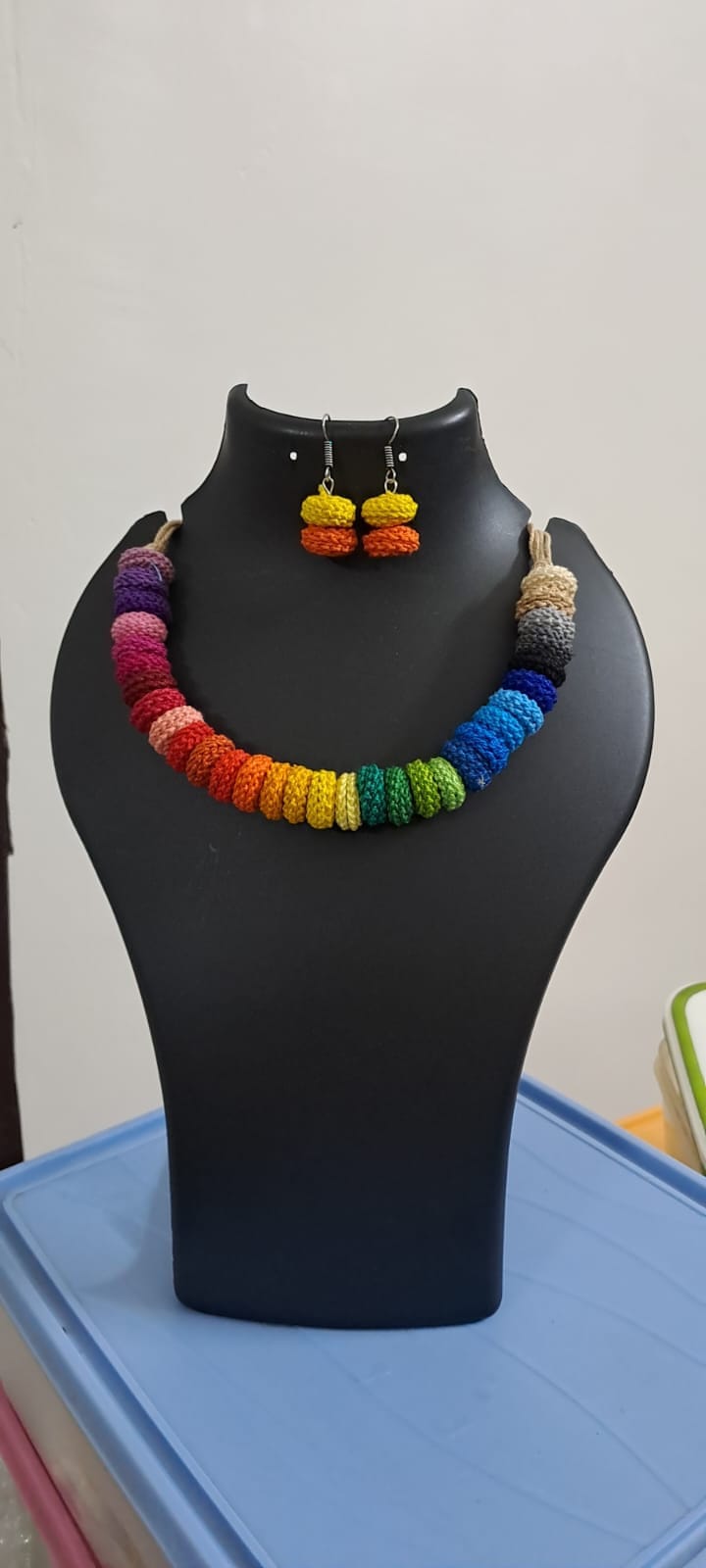 Exclusive multi coloured crochet necklace with colouful matching earrings.