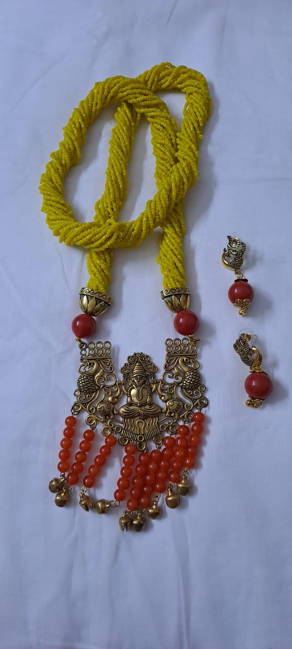 Exclusive multi layered  yellow glass seed beads necklace set with golden  oxidised pendant n earrings