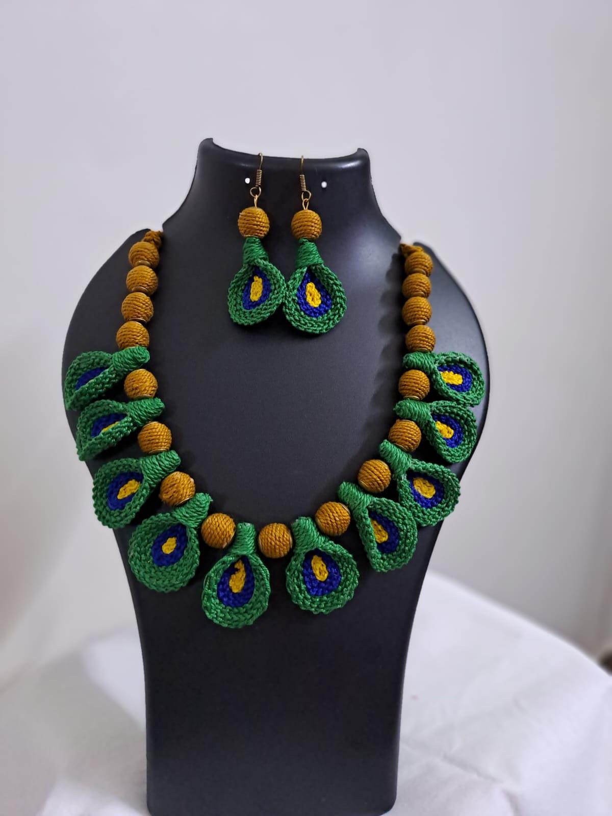 Green n yellow thread necklace with matching thread earrings.