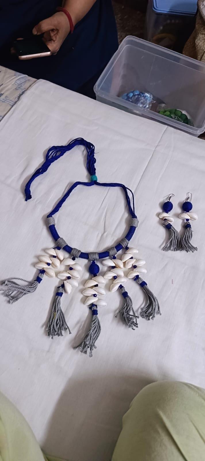Exclusive blue n grey hasuli thread necklace set with shell fringes n matching earrings
