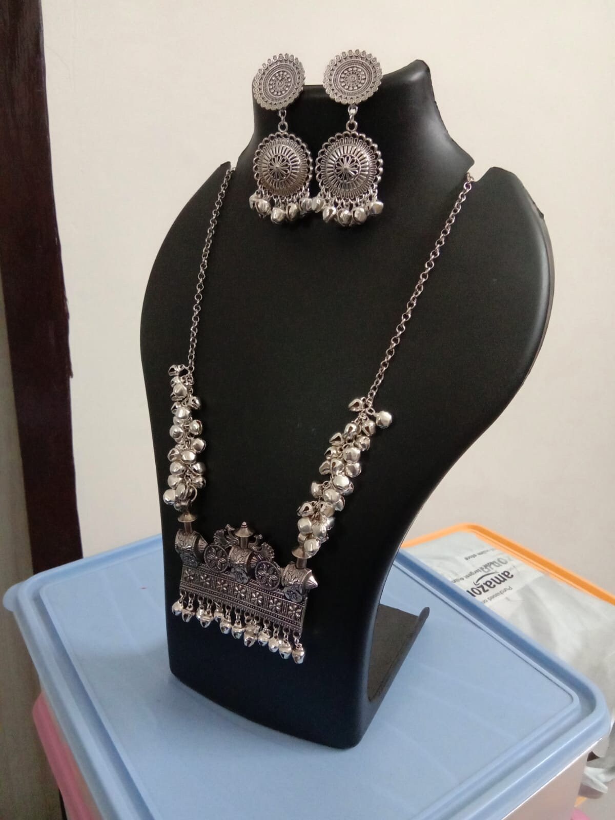 Oxidised silver chain with traditional pendant and matching earrings.