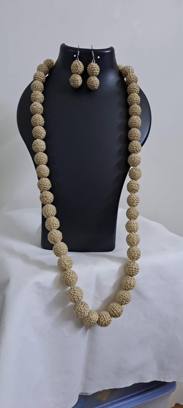 Exclusive beige colour thread beads long necklace set with matching earrings