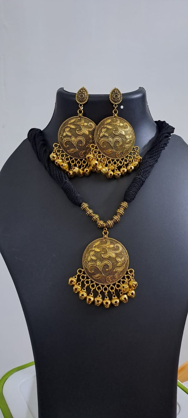 Black thread necklace with Golden oxidised traditional pendant