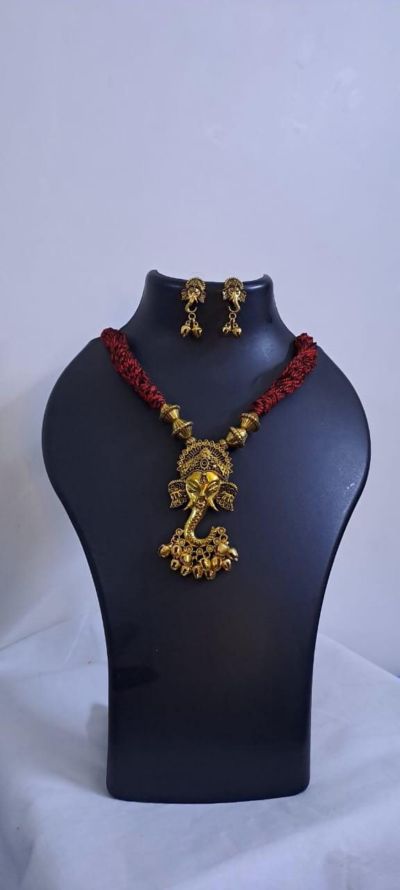 Red thread necklace with Golden oxidised traditional pendant