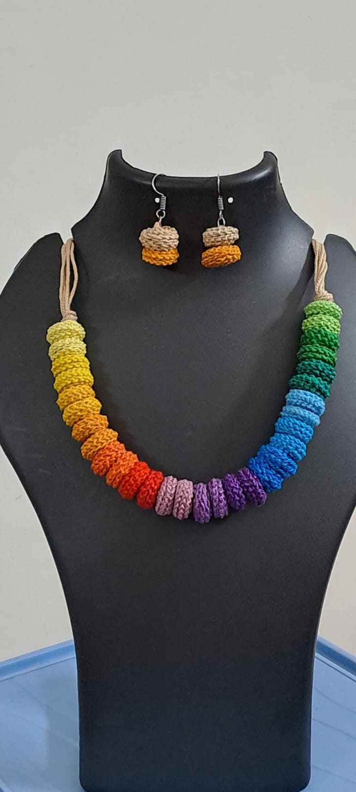 Exclusive multi coloured crochet necklace with colouful matching earrings.
