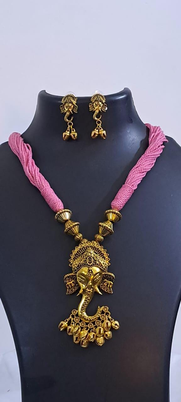 Pink thread necklace with Golden oxidised traditional pendant
