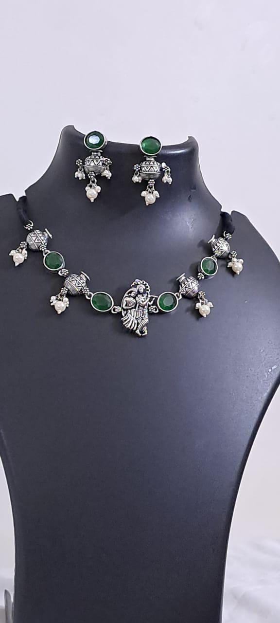 Exclusive silver oxidised lstone necklace with radha krishna pendant with matching earrings