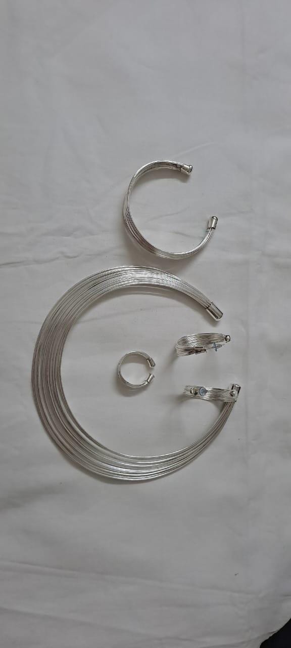 Exclusive multi layered  wired silver oxidised neckband with matching earrings, bracelet n ring
