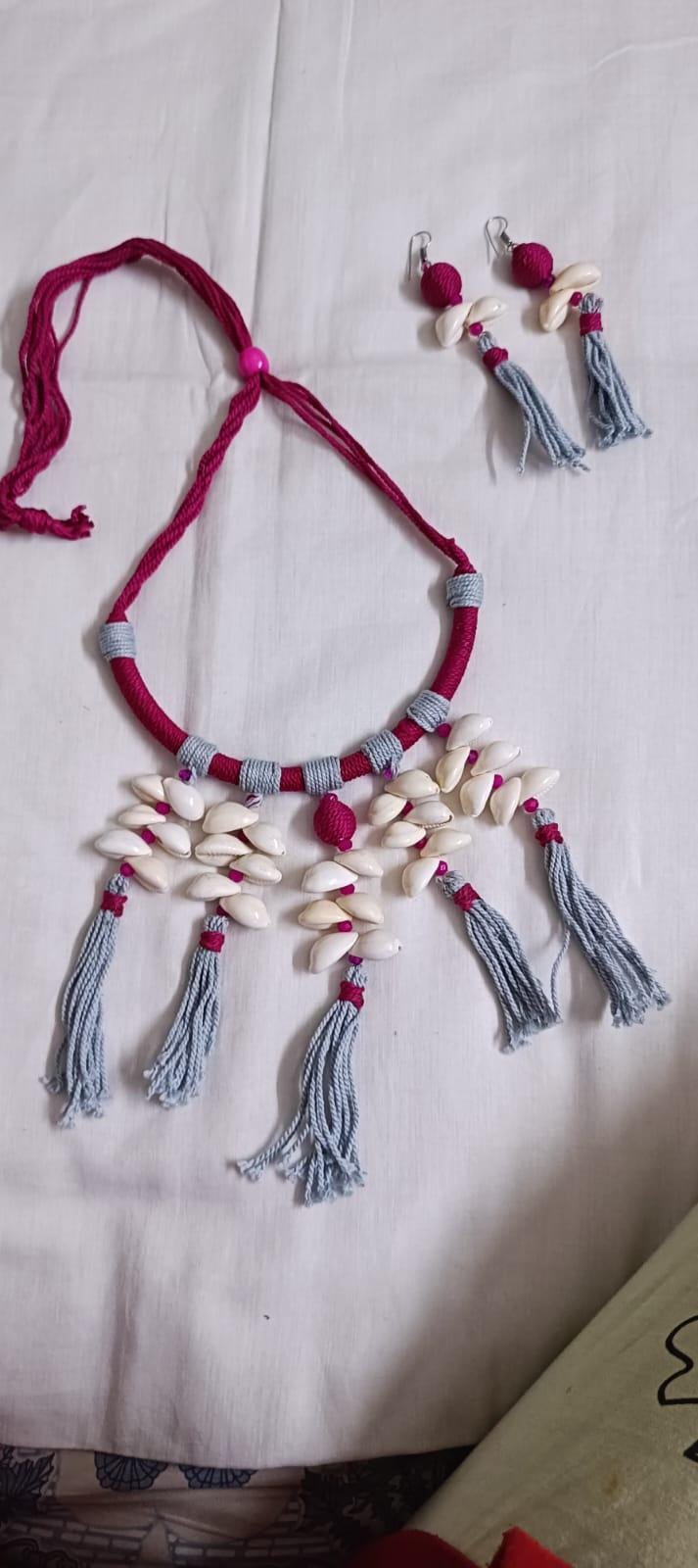 Exclusive pink n grey hasuli thread necklace set with shell fringes n matching earrings