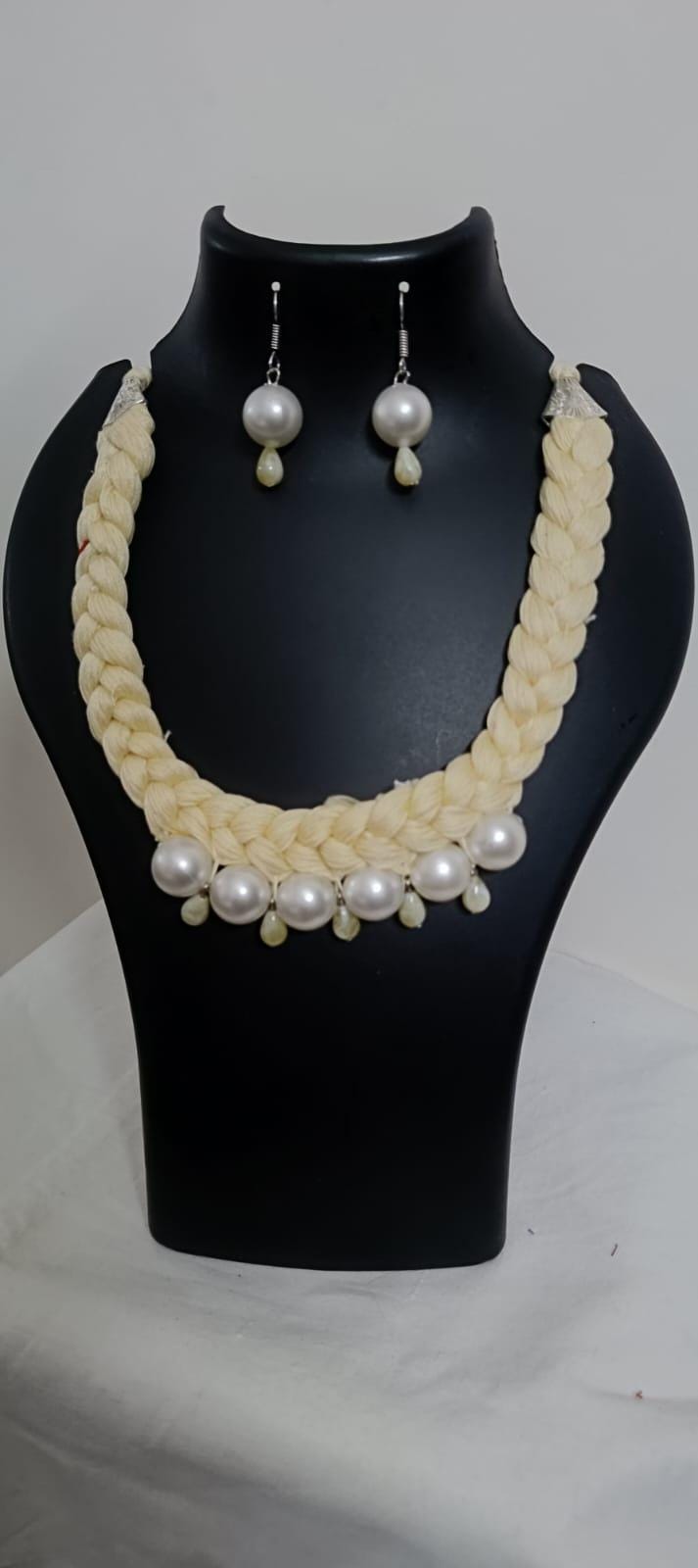 Offwhite braided thread necklace with pearl n pearl danglers