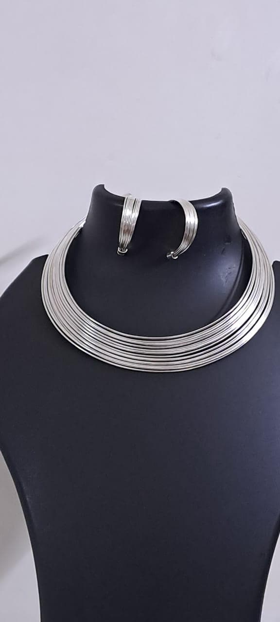 Exclusive multi layered  wired silver oxidised neckband with matching earrings, bracelet n ring