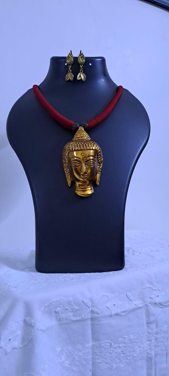 Maroon thread necklace with oxidised golden buddha pendant