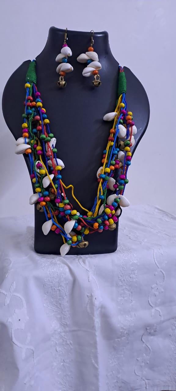 Exclusive multi-coloured and multi-layered thread necklace with shells, wooden beads n trinkets.