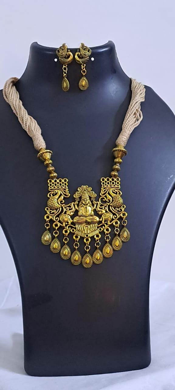 Off white thread necklace with Golden oxidised traditional pendant