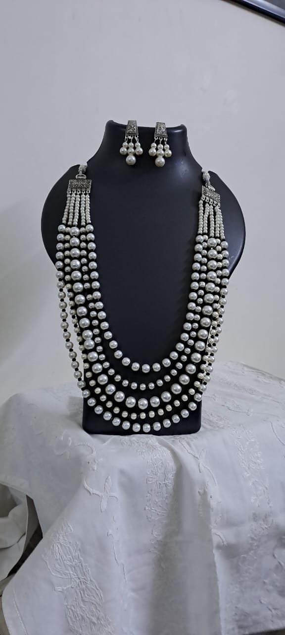 Multi layered glass pearl necklace set with matching earrings