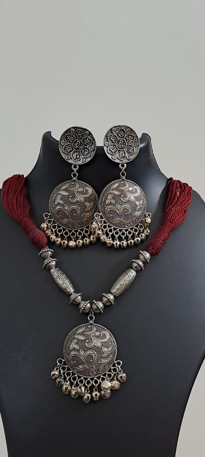 Maroon thread necklace with silver oxidised traditional pendant