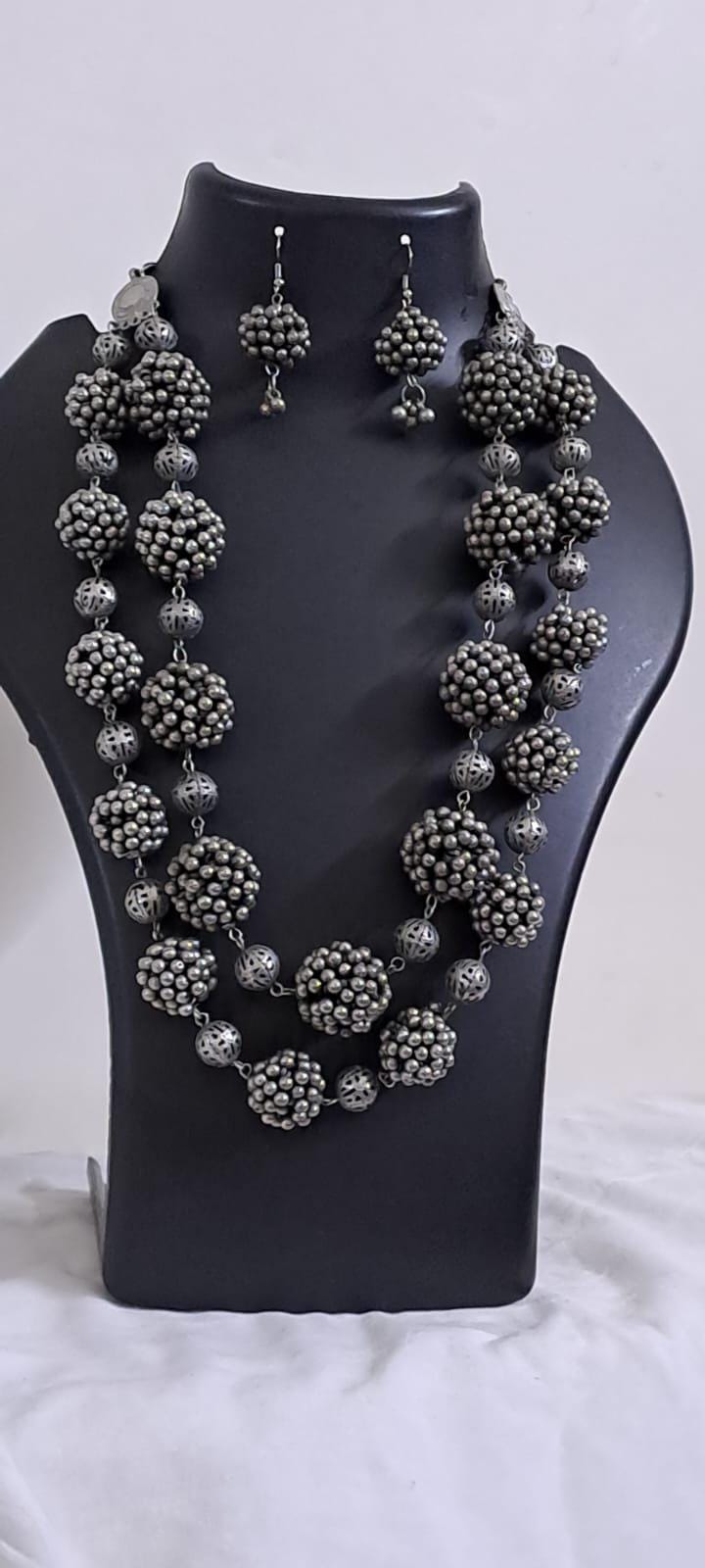 Exclusive silver oxidised long chain set with matching earrings