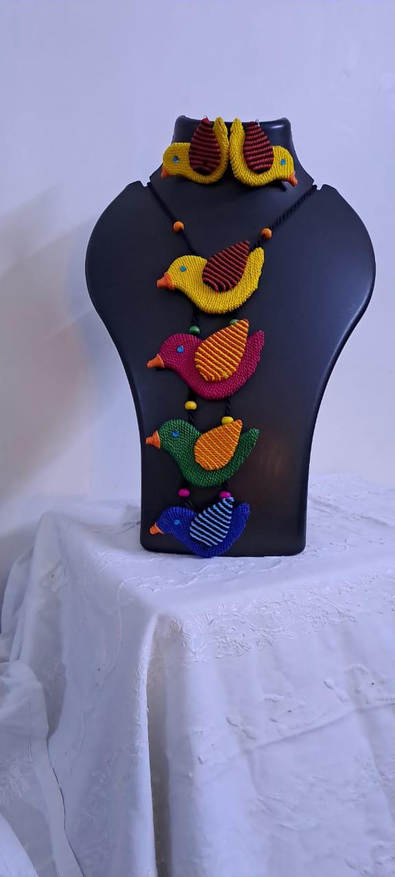 Multi coloured bird necklace and matching earrings