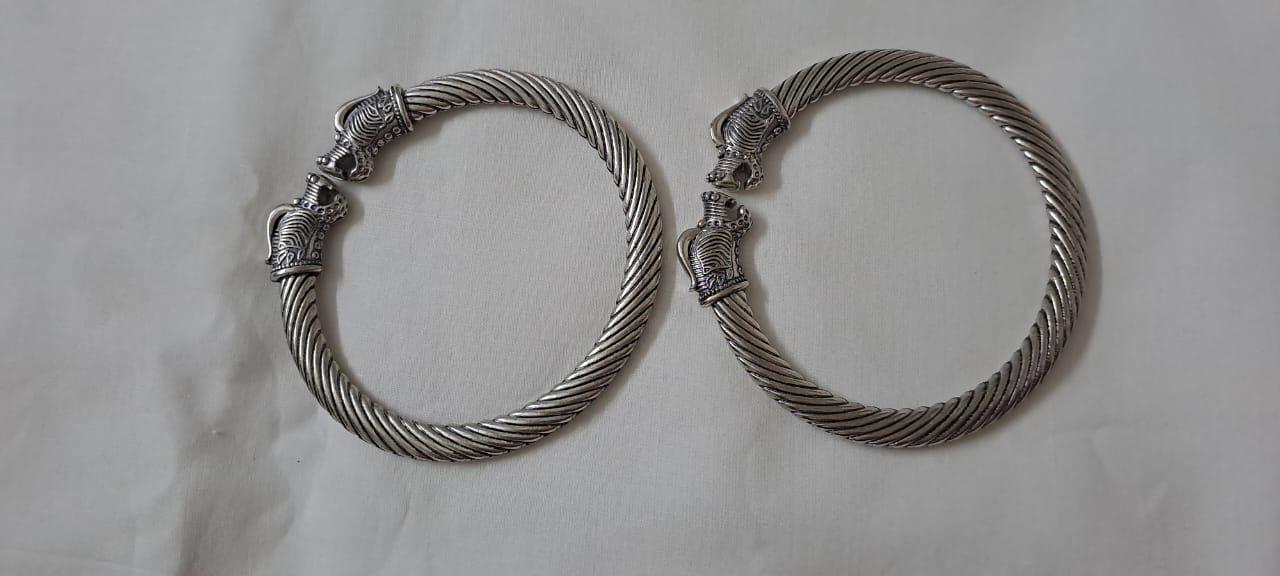 Traditional silver oxidised bangles with lion face