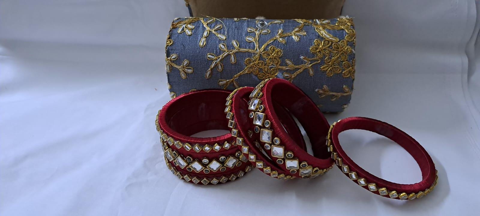 Maroon colour traditional thread kundan bangles with zari bangle box
