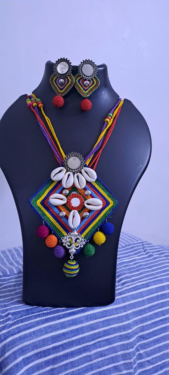 Exclusive multicoloured thread necklace set with shell n thread pendant n matching earrings
