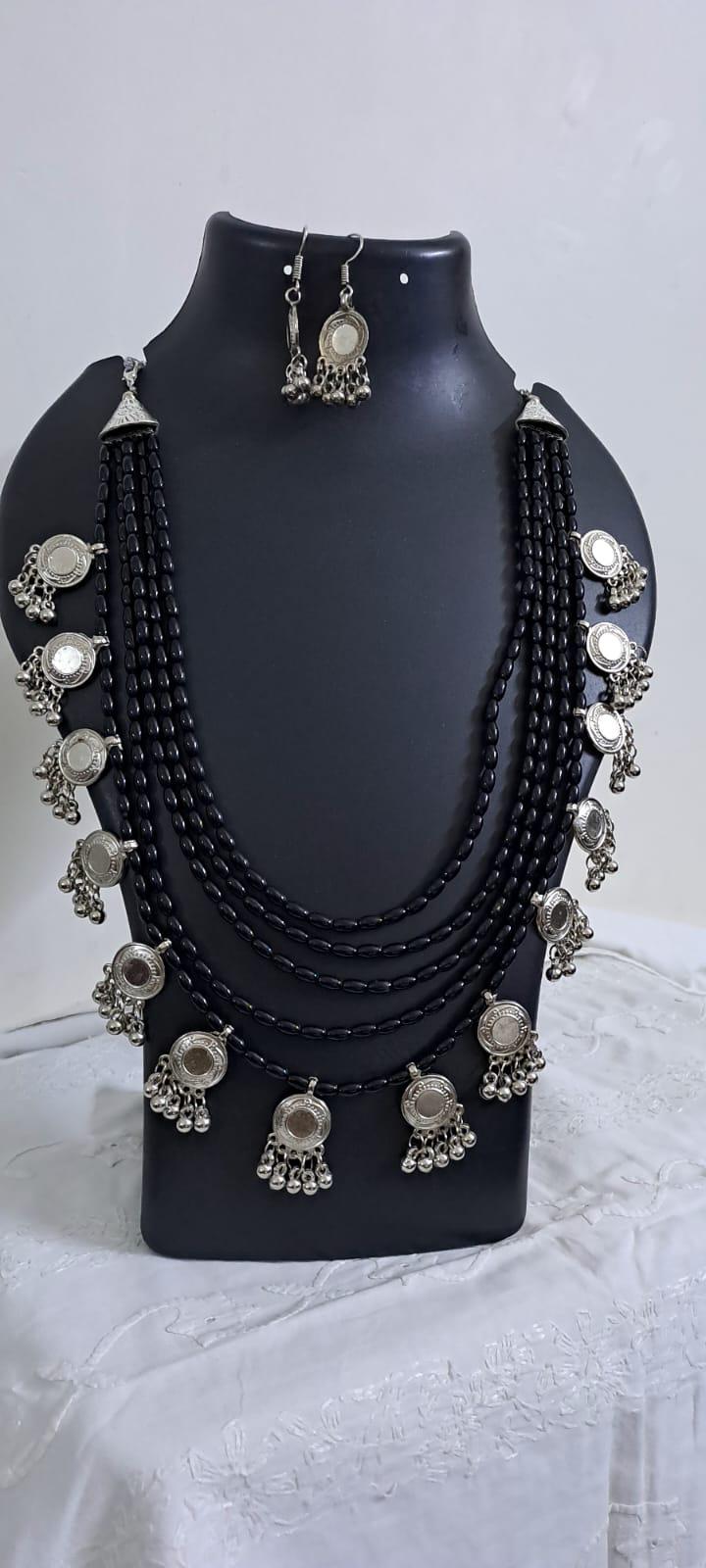 Exclusive multi layered  black glass beads necklace set with silver oxidised charms n matching earrings