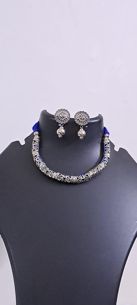 Exclusive silver oxidised hasuli set with matching earrings