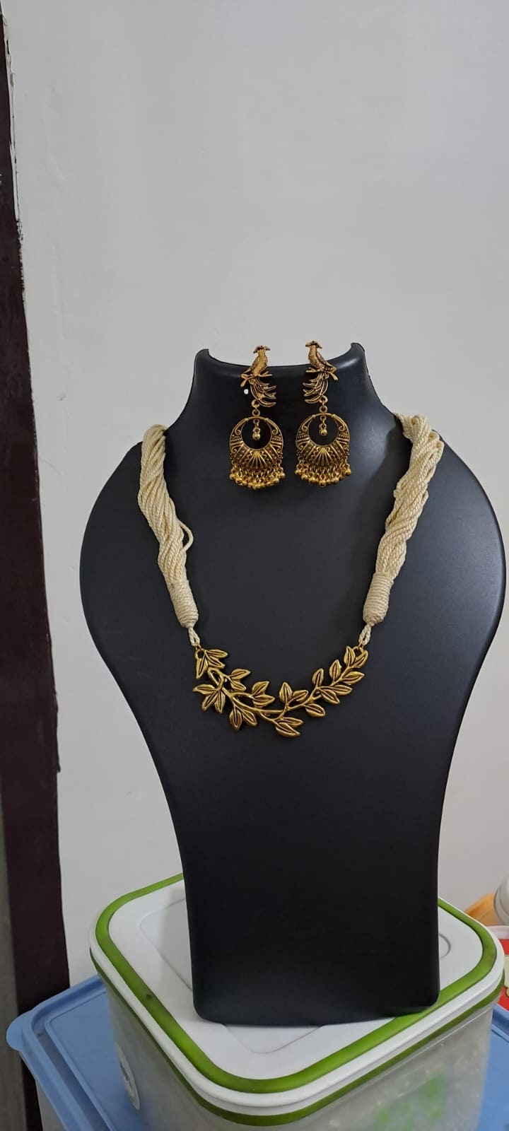 Off white thread necklace with Golden oxidised traditional pendant