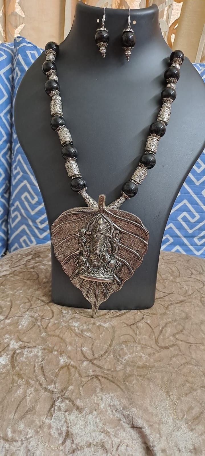 Black glass beads necklace with silver oxidised ganesha pendant