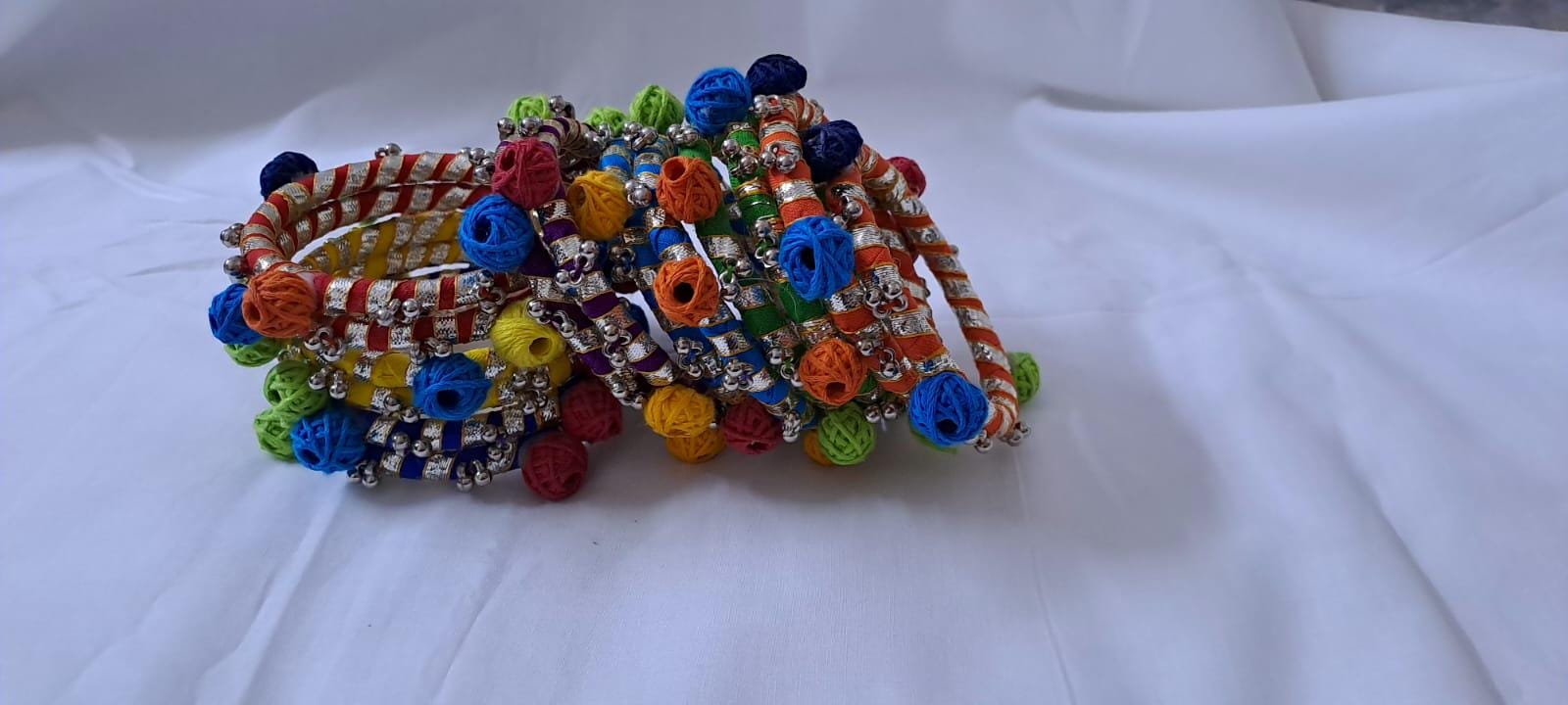 Multi colour traditional zari thread bangles with cotton beads (set of 14 bangles)