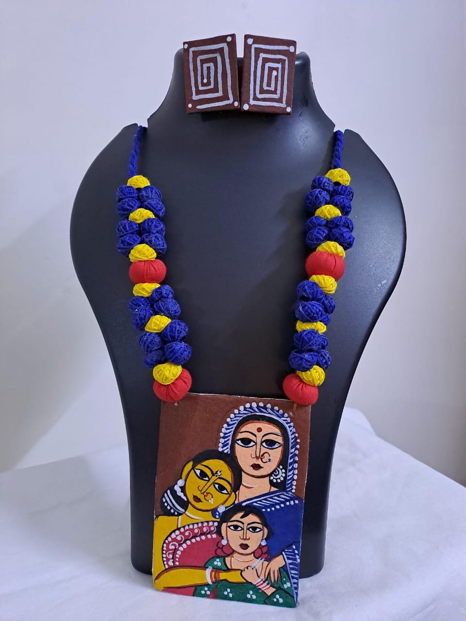 Handpainted fabric jewellery set with matching earrings