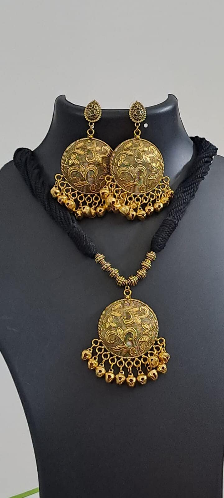 Black thread necklace with Golden oxidised traditional pendant