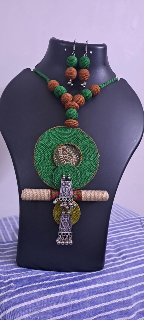 Exclusive green n brown thread beads necklace set with round thread n silver oxidised pendant n matching earrings