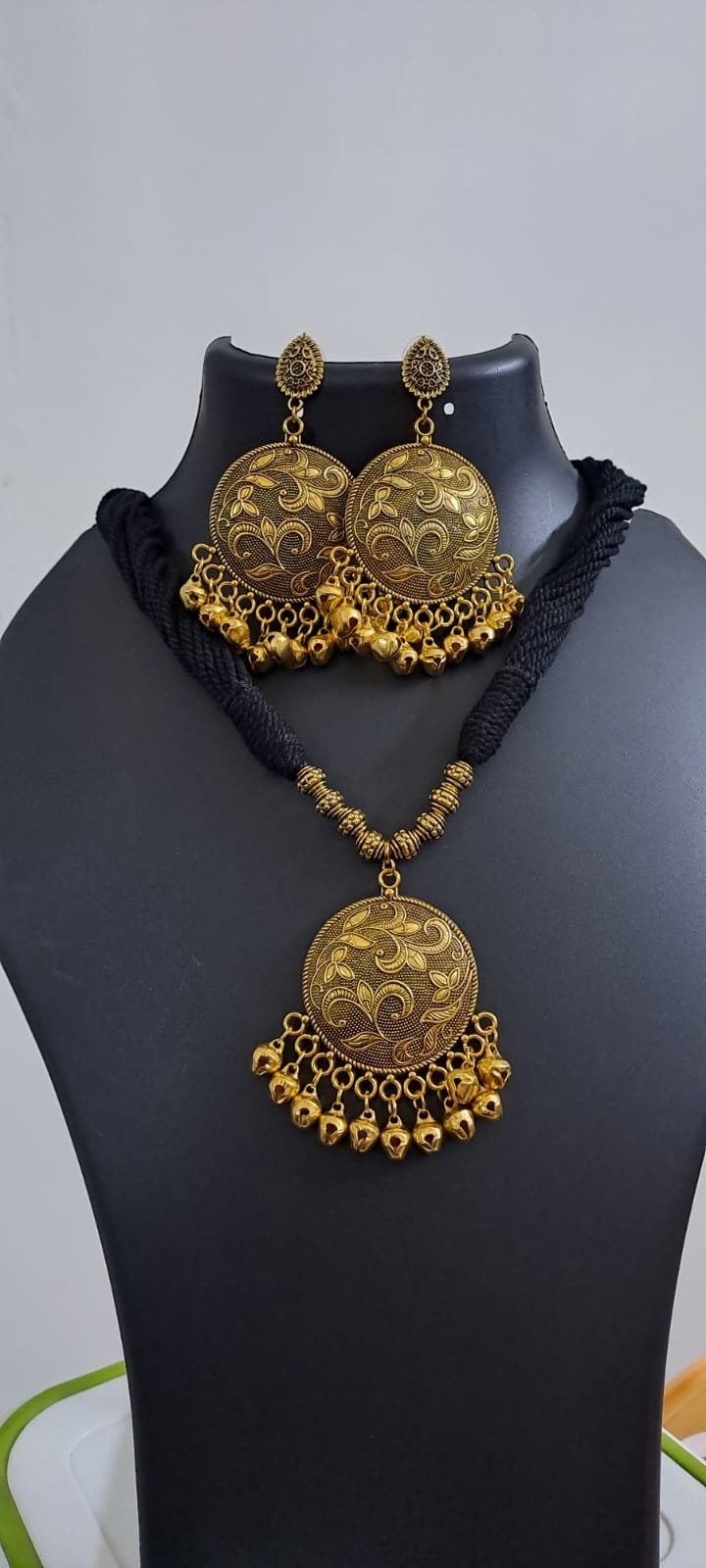 Black thread necklace with Golden oxidised traditional pendant